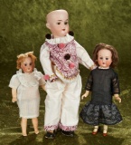 Three German and French bisque dolls including flapper lady