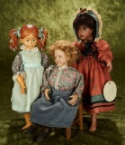 Three contemporary artist dolls