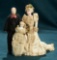 Three German bisque dollhouse dolls in original costumes 300/400