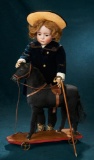 German Pull-Toy Horse with Leather Saddle on Wheeled Base 500/700