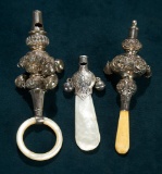 Three Elaborate Silver Baby Rattles with Bells 600/900