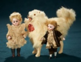 Two German All-Bisque Miniature Dolls and French Salon Dog 500/700