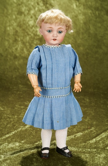 18" German bisque child doll, model 143, by Kestner with original wig. $600/800