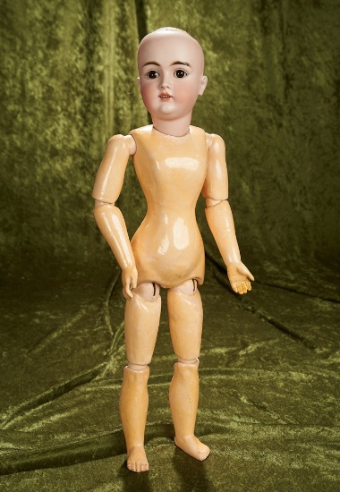 22" German bisque lady doll, 162, with original lady-shaped body. $900/1200