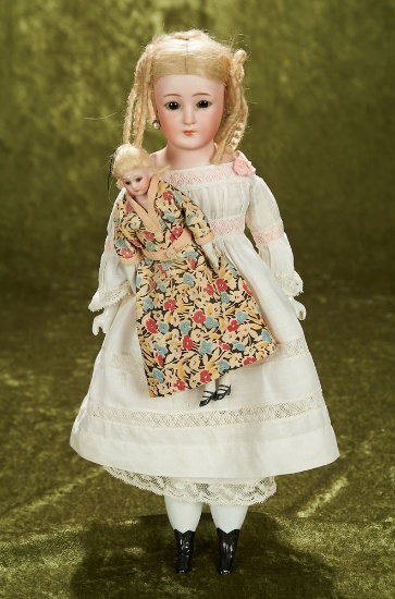 14" German bisque doll, model 1160, Simon & Halbig in rare size, holding smaller model. $600/800