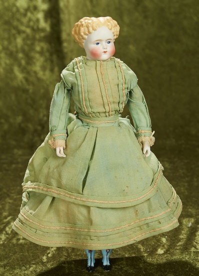 14" German bisque doll with blonde sculpted hair, original body and fancy boots