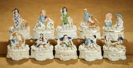 Set of Ten German Porcelain Trinket Boxes with Childhood Scenes 400/500