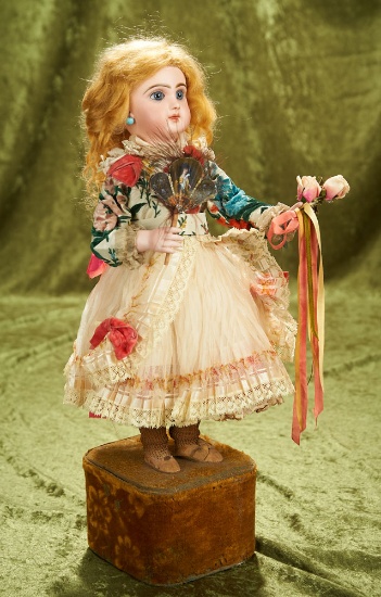 18" French musical automaton "Girl With Flowers & Fan" with a Jumeau head in working condition