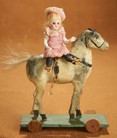 German All-Bisque Miniature "Black Stocking" Girl, with Toy Horse 400/500