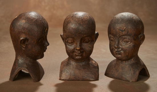 Three Carved Wooden Doll Heads 400/500