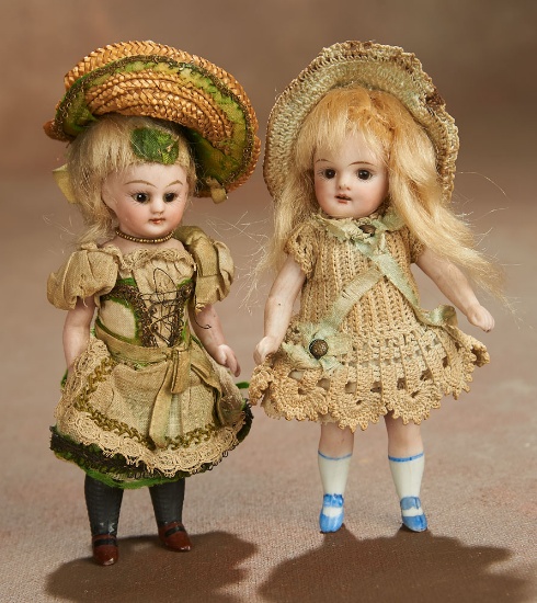 Two German All-Bisque Miniature Dolls in Original Costumes 600/800