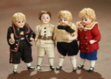 Four German All-Bisque Miniature Dolls in Original Costumes 300/400