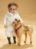 German Bisque Miniature Doll with Toy Horse 300/400
