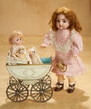 German Tinplate Carriage by Maerklin with Bisque Doll 600/800