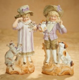 Pair, German All-Bisque Figures of Children and Their Pets 300/400