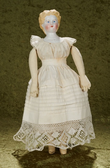 18" German bisque doll, sculpted hair and jewelry, unusual gleaming patina complexion $400/500