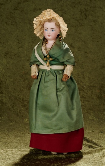15" French bisque poupee with painted eyes and original folklore costume $900/1200