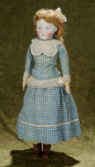 16" German bisque doll with painted eyes and closed mouth, mystery maker $400/500
