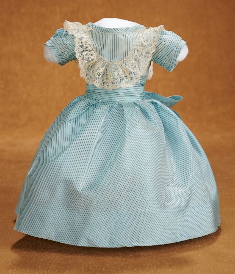 Aqua Silk Dress with Cap Sleeves and Wide Ribboned Sash. $200/300