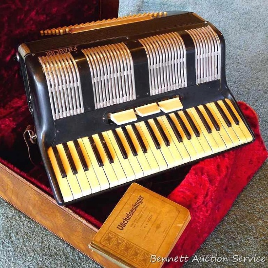 Francini accordion is ready for restoration or is perhaps usable as-is. Keys work, some skip up an