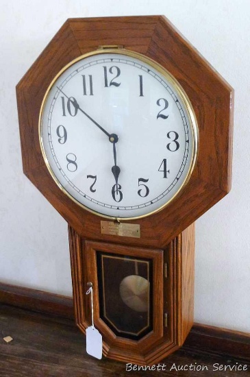 Chiming quartz wall clock was handcrafted for Nina Fawley by Arthur Anderson. Oak case is approx.