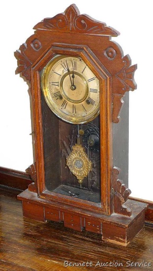 Antique wall clock by Ansonia Clock Co. is nearly 21" tall. Pendulum is marked 'Eclipse'. Both