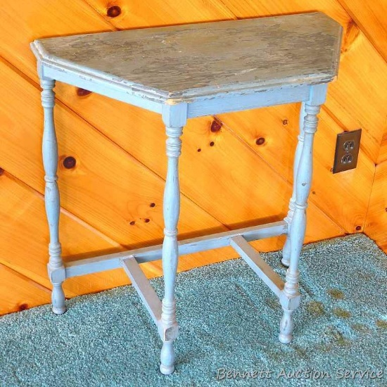 Cute little wall table is just over 2' wide and is fairly tight and sturdy.