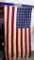 Antique United States 48 star flag with pole. Flag is approx. 30