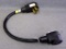 Cord adapter 50 amp to 30 amp. Approx. 2 ft. long