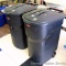 Two Rubbermaid Roughneck 45 gallon garbage cans with wheels. One lid has small crack, otherwise in