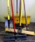 Two brooms, garden rake with fiberglass handle, garden hoe, scraper, snow shovel and flat edge