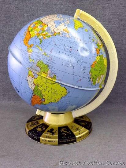 Metal globe, stand nearly 12" tall. We believe it is pre WWII based on countries that no longer