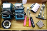Two Makita fast chargers, Model DC7100 & DC9700A; tape measure; torque tips; screwdriver and more.