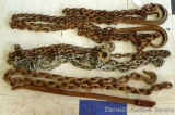 Four tie down chains and 3 ft. load binder bar or heavy duty ratchet bar. Heavy 1/2