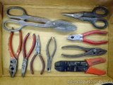 Assortment of pliers and tin snips.