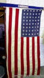 Antique United States 48 star flag with pole. Flag is approx. 30