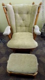 Nice glider chair with matching ottoman. Both have brushed upholstery that appears in good shape