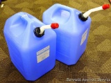 Two water jugs, each has 6 gallon capacity. Both have spigots.