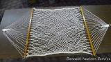 Lovely rope hammock. Approx. 5' x 10' when laying on table. In good condition.