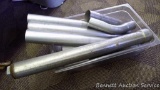 Exhaust pipes up to 2 ft. long; Two 2-1/2 and one 2-3/4 clamps; exhaust elbows.
