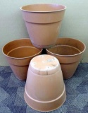 Four planters, approx. 16