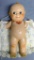 Original and antique Kewpie doll stands nearly 12