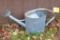 Neat old galvanized watering can is in overall good shape - minor splitting at bottom seam. Great