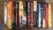 16 Hardcover Novels including: An American Killing, Uncommon Justice, Gone Girl, By Nightfall; more
