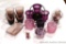 Amethyst colored glassware includes candle holders and more