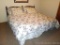 King size bed with bedding. Mattresses by Congoleum Pleasure Supreme Silver. Bed feels comfortable.