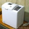 Oster Deluxe Bread & Dough Maker, makes a 2 lb. loaf. Unit is complete and appears in good
