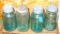 Three blue Ball Perfect Mason jars, plus one strong shoulder blue Ball jar. Each jar has its zinc