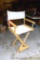 Director's chair is stool height and in overall good condition. Stands 44