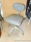 Rolling office chair with vinyl padded back and seat. Sturdy chair is in overall good condition. You